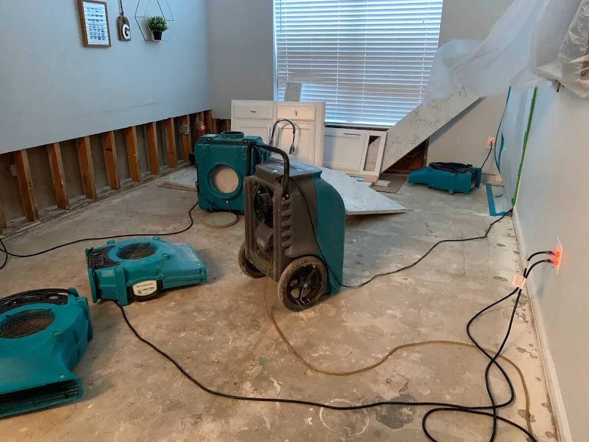 Dehumidifier in flood-cut room for Water Damage Restoration in South Valley